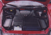 Mazda RX-8: Двухсекционный роторный Ренезис в 2003 году завоевал титул Двигатель года. B Россию будут поставлять автомобили со 192-и 231-силыными версиями мотора.